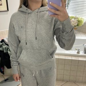 grey hoodie with black hood.